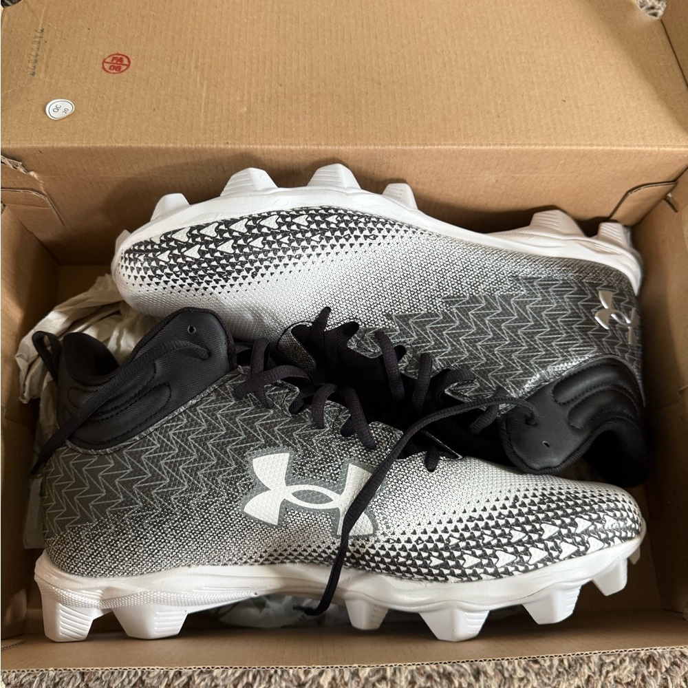 Under Armour Black and White Football Clears with Sleek Design